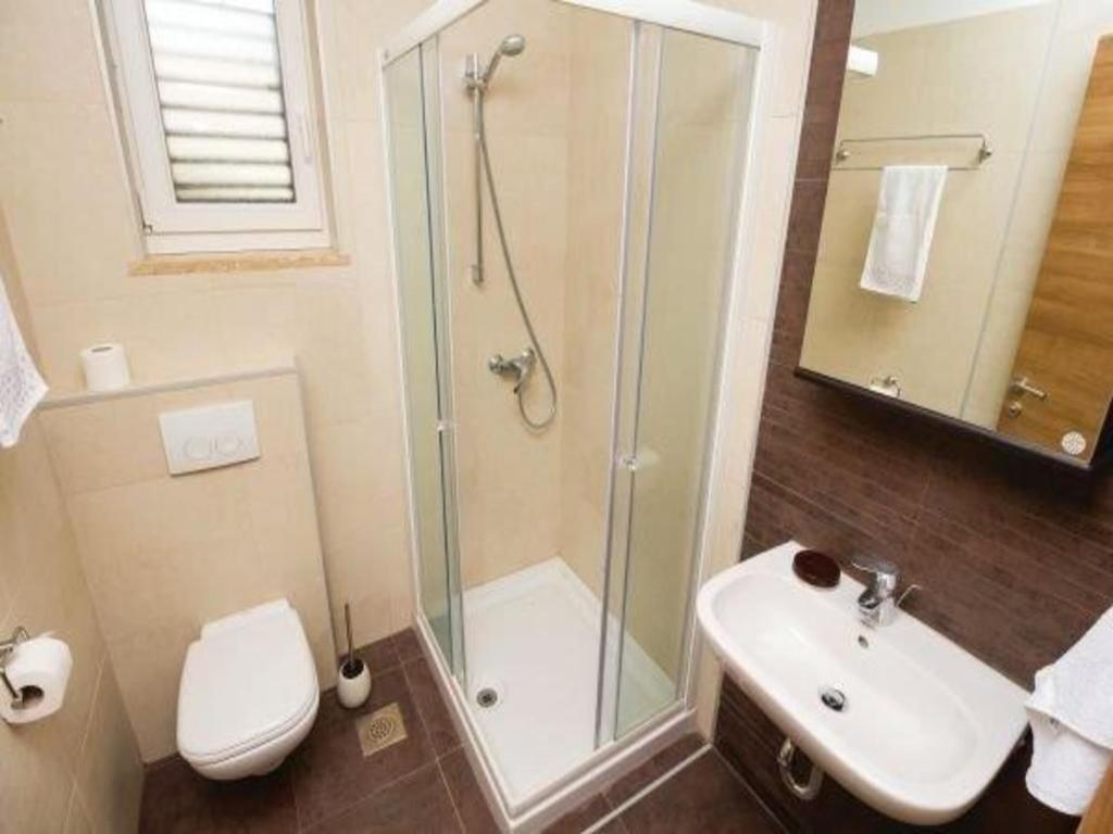 Apartments Grzic Porozina ภายนอก รูปภาพ